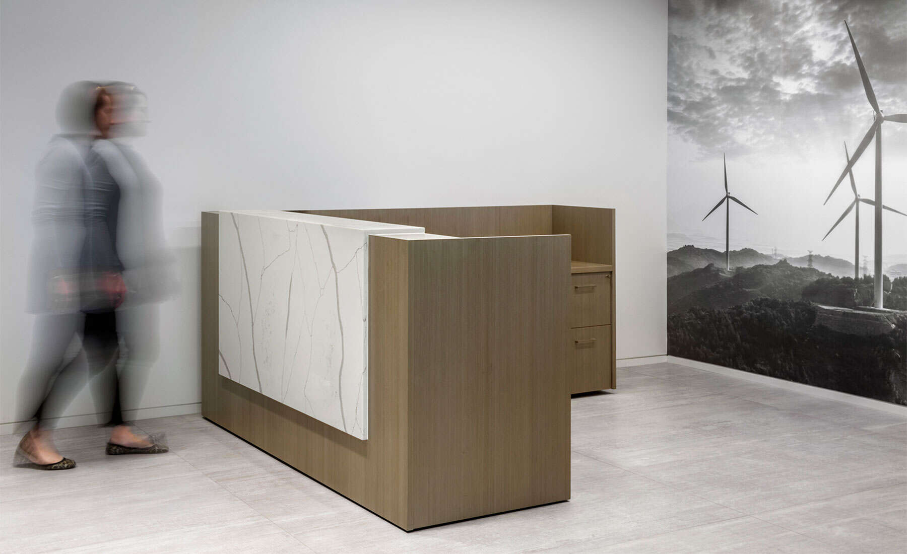 Central Park modular reception desk with premium wood veneer in corporate office lobby