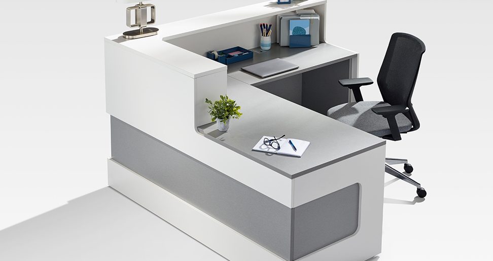 Maeva reception desk with inviting curvature in a modern NYC reception area