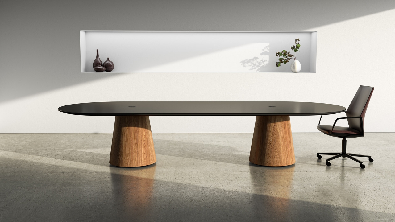 Foundation Tapered Drum conference table with sculpted base in NYC office