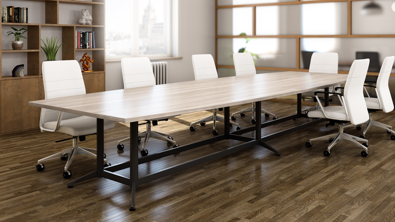 Zori conference table with split Y-legs and footer bar in NYC