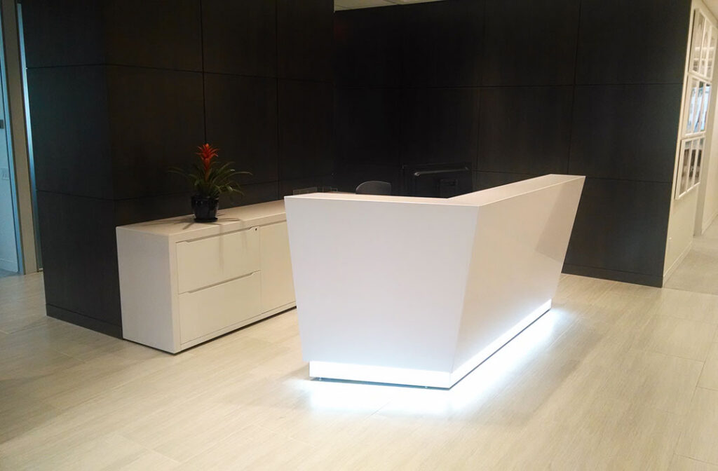 Konnect reception desk with custom materials and clean lines in a NYC office lobby