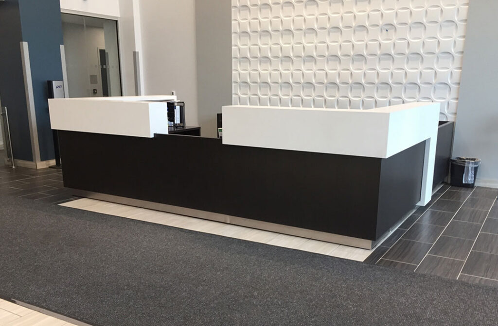 Kubist reception desk with modern architectural lines in a NYC office lobby