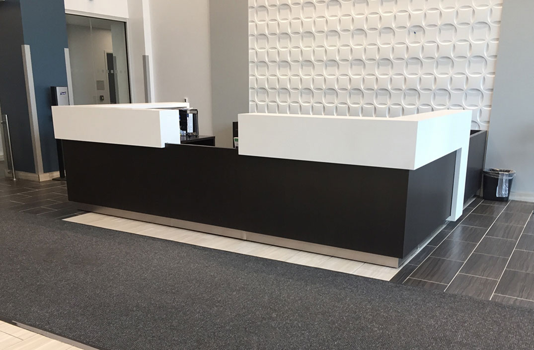 Kubist reception desk with modern architectural lines in a NYC office lobby