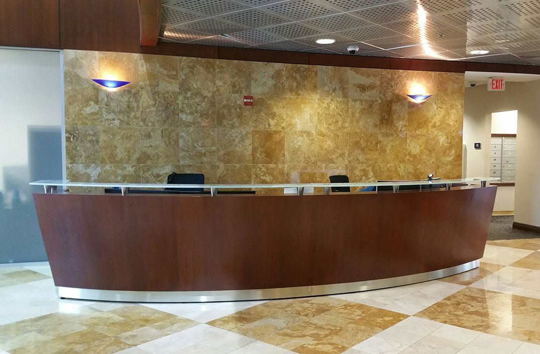 Rio reception desk with sculptural curve in a modern NYC lobby